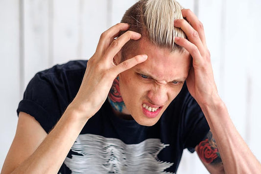 Young man with headache